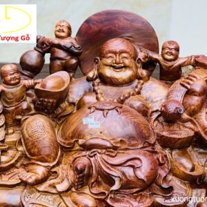 Di Lặc ngũ tiểu ngồi đống tiền gỗ cẩm.
