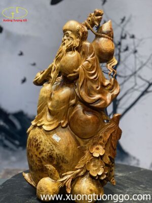 Tượng Ông Thọ Cầm Đào Gỗ Nu