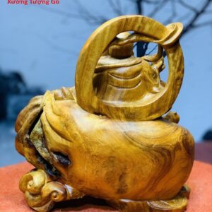 Di Lặc Ôm Đá Hương Ta