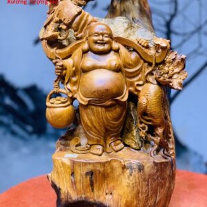 Di Lặc Gánh Gậy Đứng cây Đào