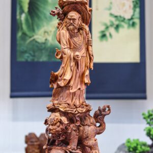 Đạt ma đứng lân gỗ sưa