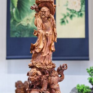 Đạt ma đứng lân gỗ sưa