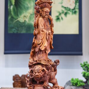 Đạt ma đứng lân gỗ sưa