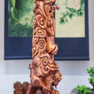 Đạt ma đứng lân gỗ sưa