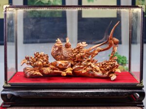 Chim trĩ hoa phù dung gỗ sưa