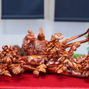 Chim trĩ hoa phù dung gỗ sưa