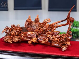 Chim trĩ hoa phù dung gỗ sưa