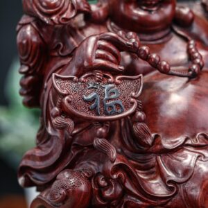 Di lặc cưỡi long quy tử đàn