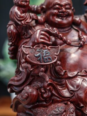 Di lặc cưỡi long quy tử đàn
