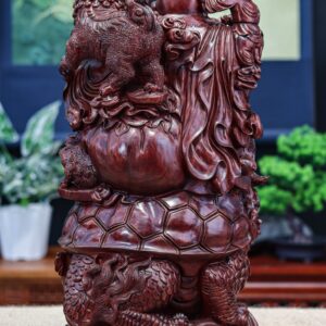 Di lặc cưỡi long quy tử đàn