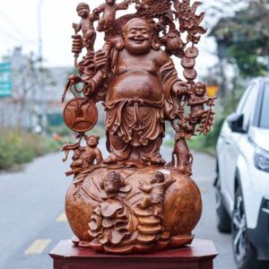 Di Lạc Vác Cành Đào Ngũ Tiểu Đứng Bao Tiền Gỗ Nu Hương