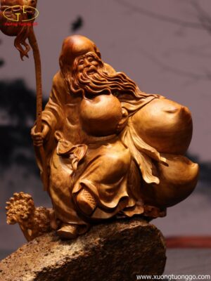 Tượng Ông Thọ Ôm Đào Ngồi Đá