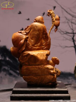 Tượng Ông Thọ Ôm Đào Ngồi Đá
