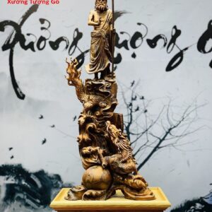 Tượng Đạt Ma ngự rồng gỗ nu hương.