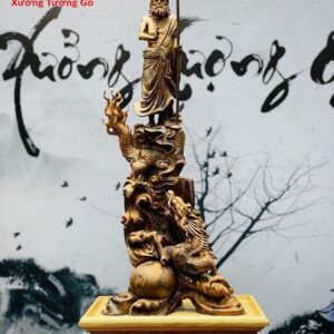 Tượng Đạt Ma ngự rồng gỗ nu hương.