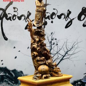 Tượng Đạt Ma ngự rồng gỗ nu hương.