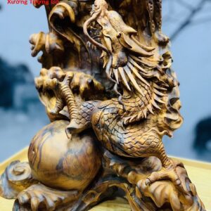 Tượng Đạt Ma ngự rồng gỗ nu hương.