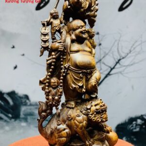 Di Lặc tam tiểu gánh hoa sen gỗ cẩm lai.