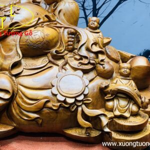 Di Lặc ngũ tiểu ngồi bao tiền.