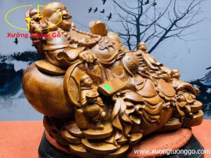 Di Lặc ngũ tiểu ngồi bao tiền.