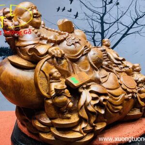 Di Lặc ngũ tiểu ngồi bao tiền.