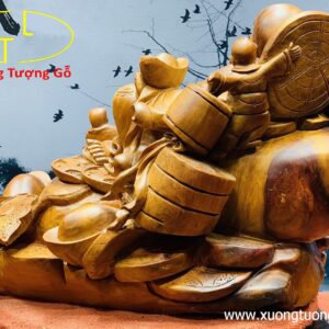 Di Lặc ngũ tiểu ngồi bao tiền.