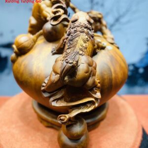 Tam nghê trấn chum tiền gỗ hương.