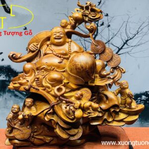 Di lặc ngũ tiểu vác gậy như ý.