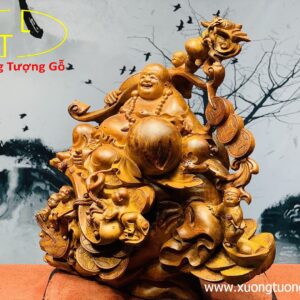 Di lặc ngũ tiểu vác gậy như ý.