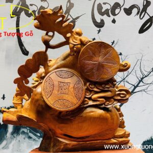 Di lặc ngũ tiểu vác gậy như ý.