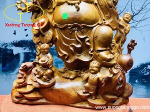 Di lặc tam tiểu vác đào đứng bao tiền.