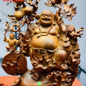 Di lặc nhị tiểu vác đào đứng bao tiền gỗ hương ta.