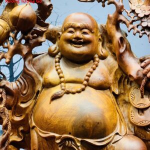 Di lặc nhị tiểu vác đào đứng bao tiền gỗ hương ta.