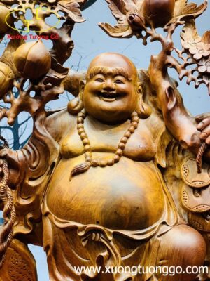 Di lặc nhị tiểu vác đào đứng bao tiền gỗ hương ta.