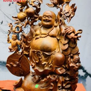 Di lặc nhị tiểu vác đào đứng bao tiền gỗ hương ta.