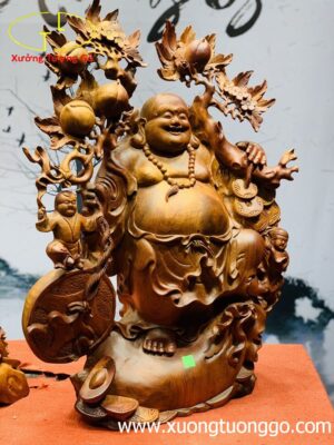 Di lặc nhị tiểu vác đào đứng bao tiền gỗ hương ta.