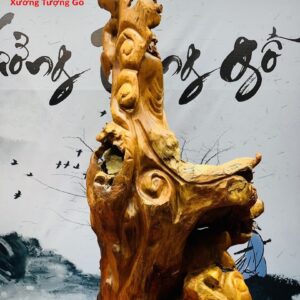 Đạt Ma đứng rồng ôm đá gỗ hương.