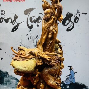 Đạt Ma đứng rồng ôm đá gỗ hương.