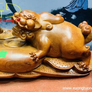 Nhị Nghê trấn chum tiền gỗ hương.
