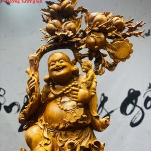 Di Lặc ngũ phúc vác cành đào gỗ hương ta.