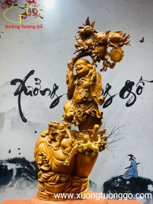 Di Lặc ngũ phúc vác cành đào gỗ hương ta.