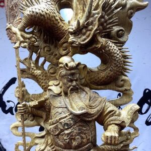 Quan công cầm đao gỗ mun đuôi công.