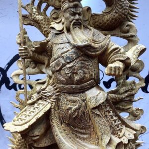 Quan công cầm đao gỗ mun đuôi công.