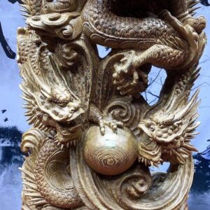 Quan công cầm đao gỗ mun đuôi công.