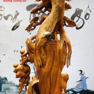Di Lặc nhị tiểu gánh gậy như ý đứng tùng gỗ hương ta.