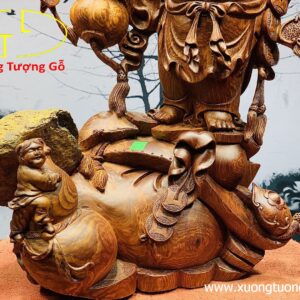 Di Lặc nhị tiểu vác đào đứng bao tiền gỗ cẩm lai.