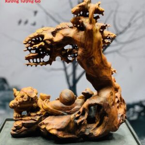 Di Lặc nhị tiểu ngồi tùng gỗ sưa.