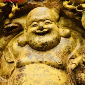 Di Lặc nhị tiểu vác đào nu hương.