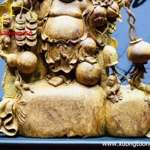Di Lặc ngũ tiểu vác đào nu hương.