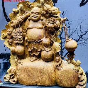 Di Lặc ngũ tiểu vác đào nu hương.
